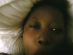 Ebony American Girl Lies Down On The Bed, While Sucking Cock.