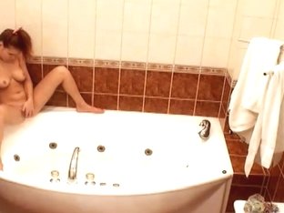 Redhead Washes Her Tasty Vagina In The Bathroom