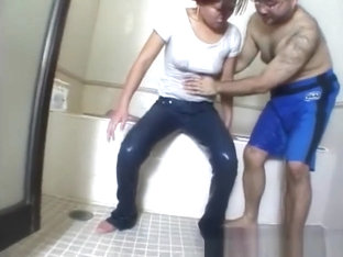 Helping A Young Woman In Wet Jeans In The Bath