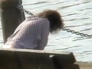 Amateur MILF Caught Pissing On The River Bank