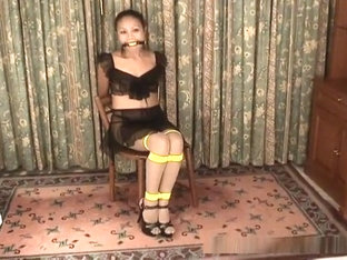 Hot Asian Girl Ann Is Tied To A Chair