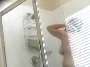 Hidden Camera Caught A Hot Milf Taking A Shower