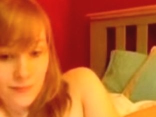Redheaded Babe Posing On A Camera