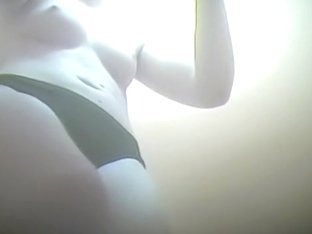 Girl After The Pool Shakes Her Nude Tits In Changing Room