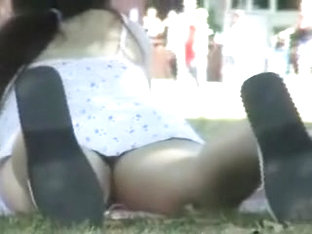 Lying On The Green Grass Babe Demonstrates Her Upskirt B01f