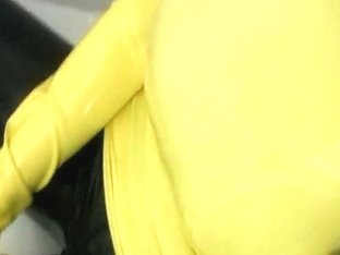 Girl In Yellow Spandex Uniform Has Orgasm In Bathroom