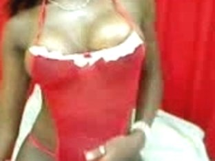 Beautiful Black Lady Shows Her Body In Front Of Red Curtain