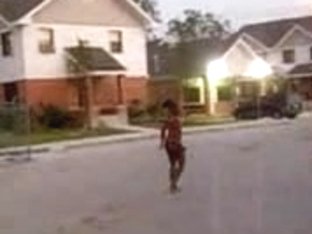 Curly Black Slut Walks Naked Around The Neighborhood