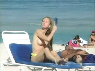 Topless Beach Voyeur Shots Of Cute Girls Relaxing Themselves