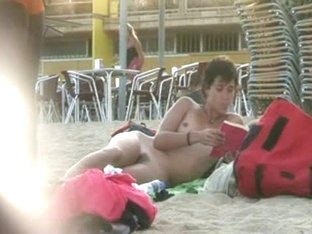 Short Haired Sweetie Filmed On A Nudist Beach