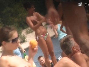 Nude Guys And Girls Are Having Fun On The Beach