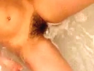 Busty Unshaven Girl Masturbates In The Bathtub