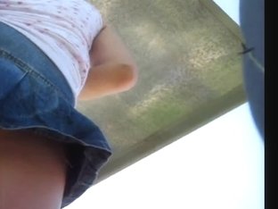 A Candid Cam View Up The Jeans Skirt Reveals A Sweet Ass