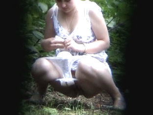 A Menstruating Woman Pissing In The Forest