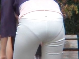 Street Candid View Of The Sexy Ass In White Pants