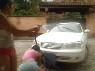 Latin Teens Wash A Car
