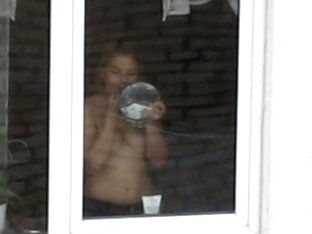 A Hot Topless Chick Has No Idea There Is A Voyeur Filming Her