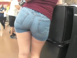 Tight Denim Shorts Cling To Her Nice Ass