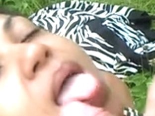 Black girlfriend devouring my white dong in a park