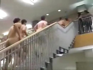 Bunch Of Naked Students Running Up The Stairs