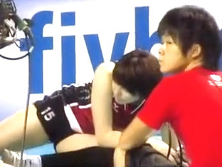Asian Volleyball Girls Stretch Before A Match