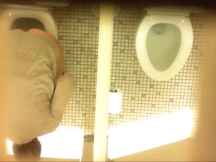 Desperate MILF Takes A Long Piss In The Ladies Room