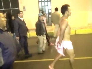 Cops Walk A Nearly Naked Criminal Down The Street