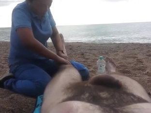 Hairy Guy Gets A Leg Massage On The Beach