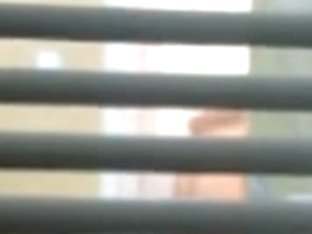 Lovely Girl Gets Filmed Trough The Window On A Spy Camera