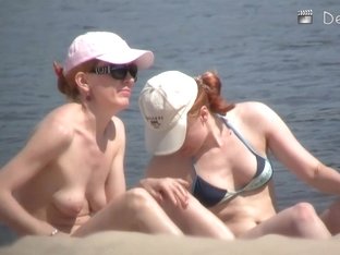 Xxx Beach Porno Vid Of Some Topless Women Apply Tanning Lotion