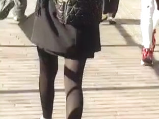 Mixed Race Lady In Skirt And Tights