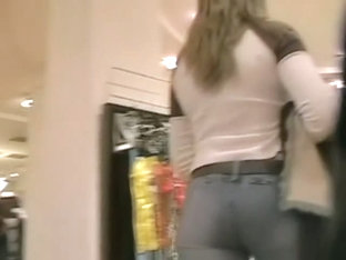 Milf In Tight Jeans In The Clothing Shop Becomes The Street Candid