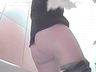 Public toilet camera caught this girl wiping her cunt
