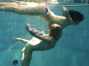 Two Sexy Amateurs Showing Their Bodies Off Under Water