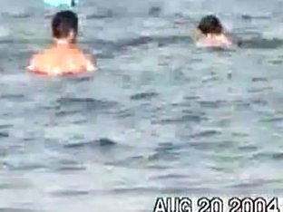 Sassy Couple Voyeured In The Water Seems To Be Fucking