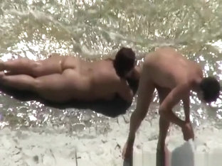 Chubby Nudist Woman Sunbathing And Swimming