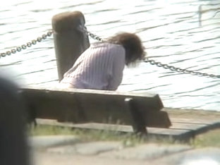 Amateur MILF Caught Pissing On The River Bank