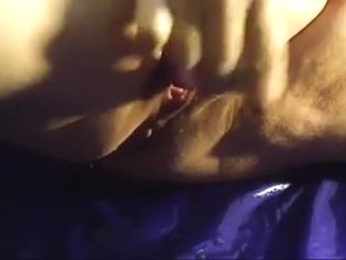 Aged Wife Masturbating With A Small Purple Toy And Squirting