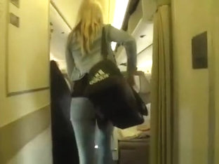 Hot Blonde In Tight Jeans Pants Seat In Airplane