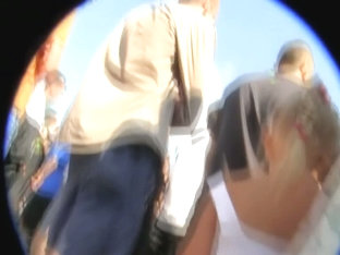 A Skilful Voyeur Upskirt Shot Made In A Large Crowd