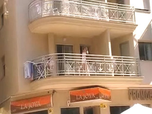 Voyeur 21, A Babe No Panties At Her Balcony