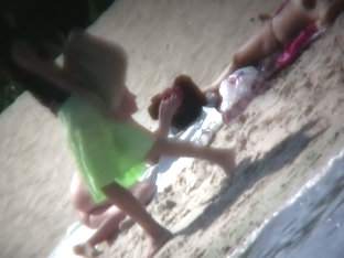Beach spy voyeur captures two friends sunbathing topless