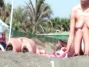 Nudist Chicks In Water And Sunbathing