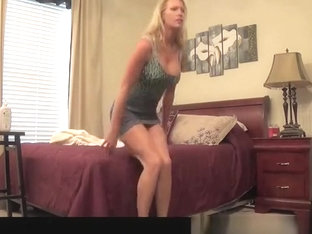Hot Blonde Dressing In Bedroom For Camera