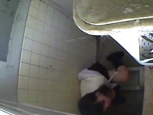 A Horny Asian Chick Masturbating In The College Toilet