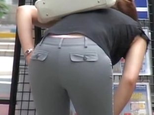 Babe In Tight Pants Bends Over And Gets On Candid Butt Video