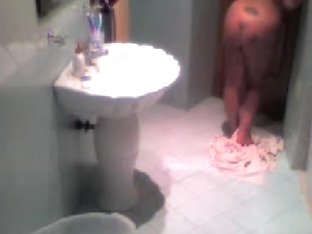 Brunette Gets Naked In The Bathroom And Filmed On A Spy Cam