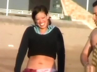 Voyeur Tapes A Crazy Girl Riding Her BF Upskirt At The Beach