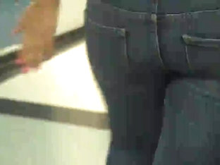 Big Butt In Jeans Parading Her Ass Round
