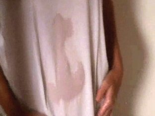 Skinny Cute Girl Looks Attractive In Wet White T-skirt
